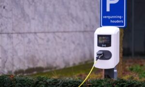 A parking meter on the side of the road