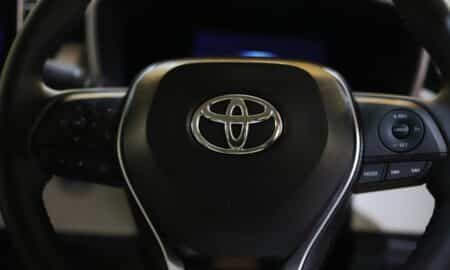 a close up of a steering wheel of a car