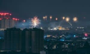 concrete buildings with view of fireworks
