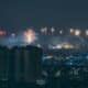 concrete buildings with view of fireworks