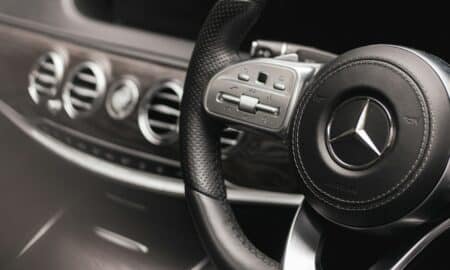 a steering wheel and dashboard of a car