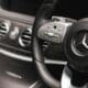 a steering wheel and dashboard of a car