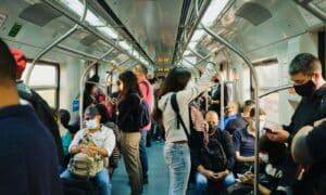 people in train during daytime