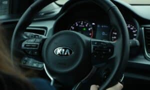 black and gray mercedes benz steering wheel