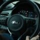 black and gray mercedes benz steering wheel