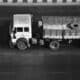 a black and white photo of a truck