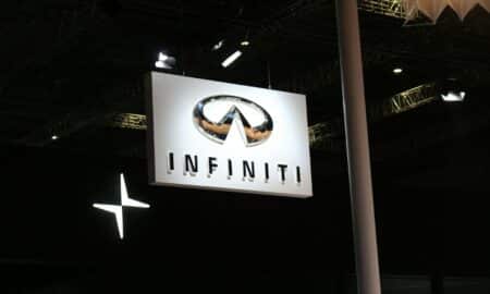 a sign hanging from the ceiling of a building