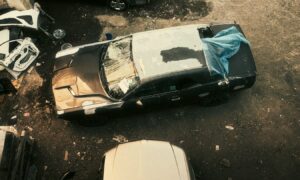 a car that is sitting in the dirt