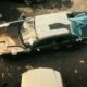 a car that is sitting in the dirt