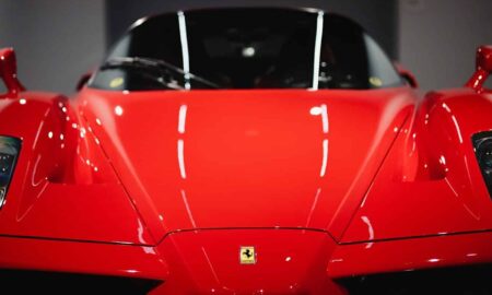 a red sports car parked in a garage