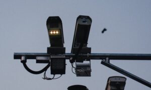 a couple of lights that are on a pole