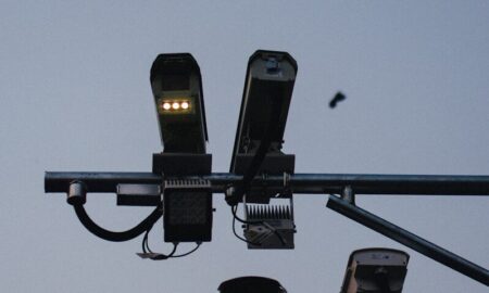 a couple of lights that are on a pole
