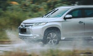 silver suv on road during daytime