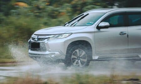 silver suv on road during daytime