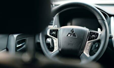 black honda steering wheel in close up photography
