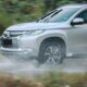 silver suv on road during daytime