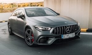 black mercedes benz coupe on road during daytime