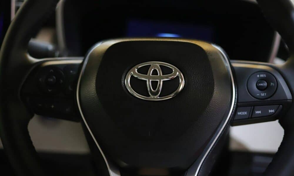 a close up of a steering wheel of a car