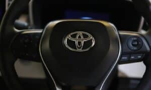 a close up of a steering wheel of a car