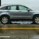 gray suv on gray asphalt road during daytime