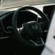 a steering wheel and dashboard of a car