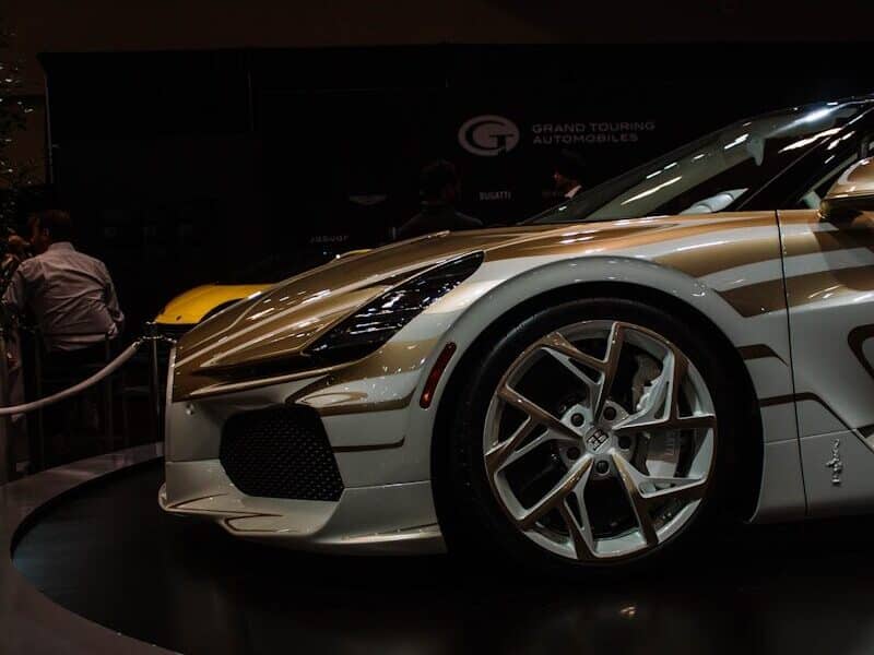 A custom sports car with unique gold accents on display