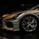 A custom sports car with unique gold accents on display