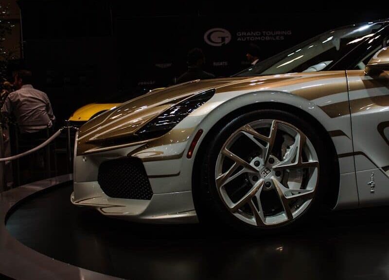 A custom sports car with unique gold accents on display
