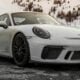 silver porsche 911 on road during daytime