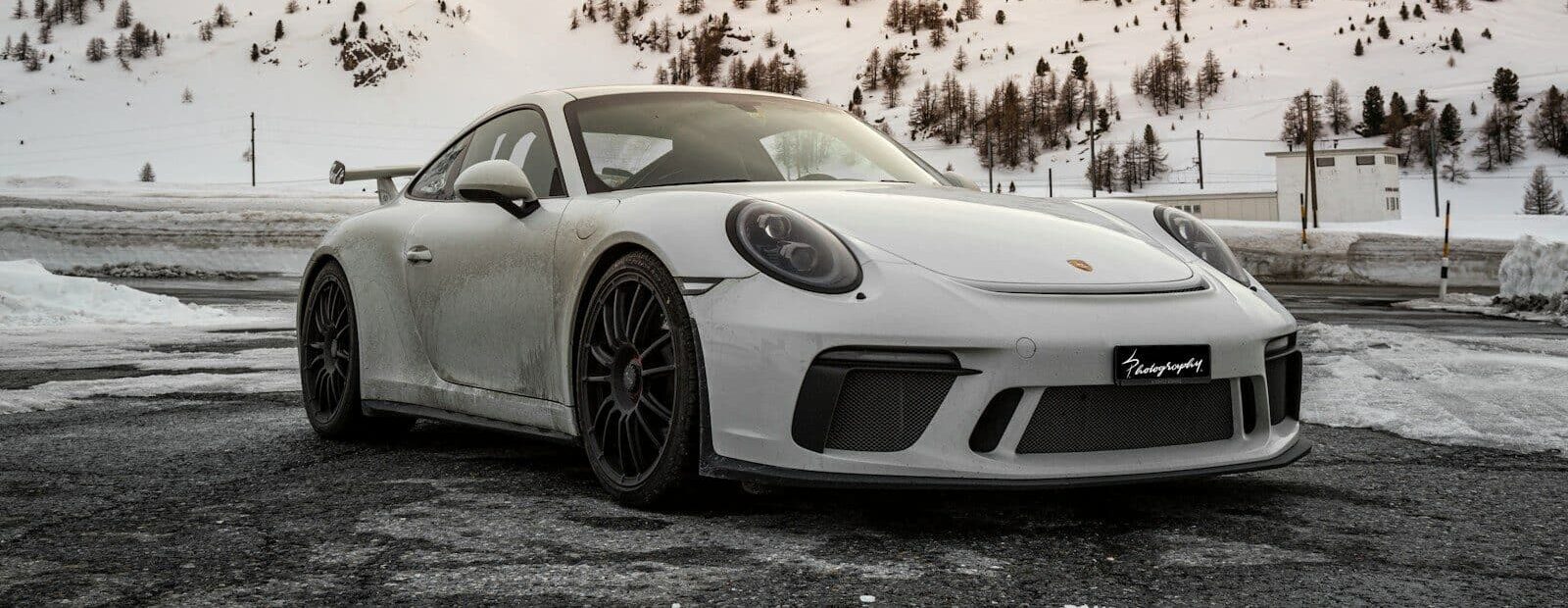 silver porsche 911 on road during daytime