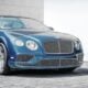 blue coupe on road