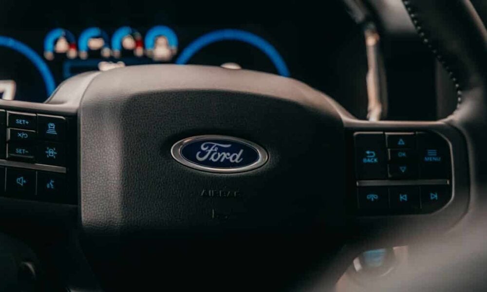 a close up of the steering wheel of a car