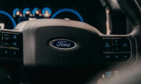 a close up of the steering wheel of a car