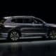 Dark blue suv parked on a reflective surface