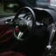 black and silver mercedes benz steering wheel