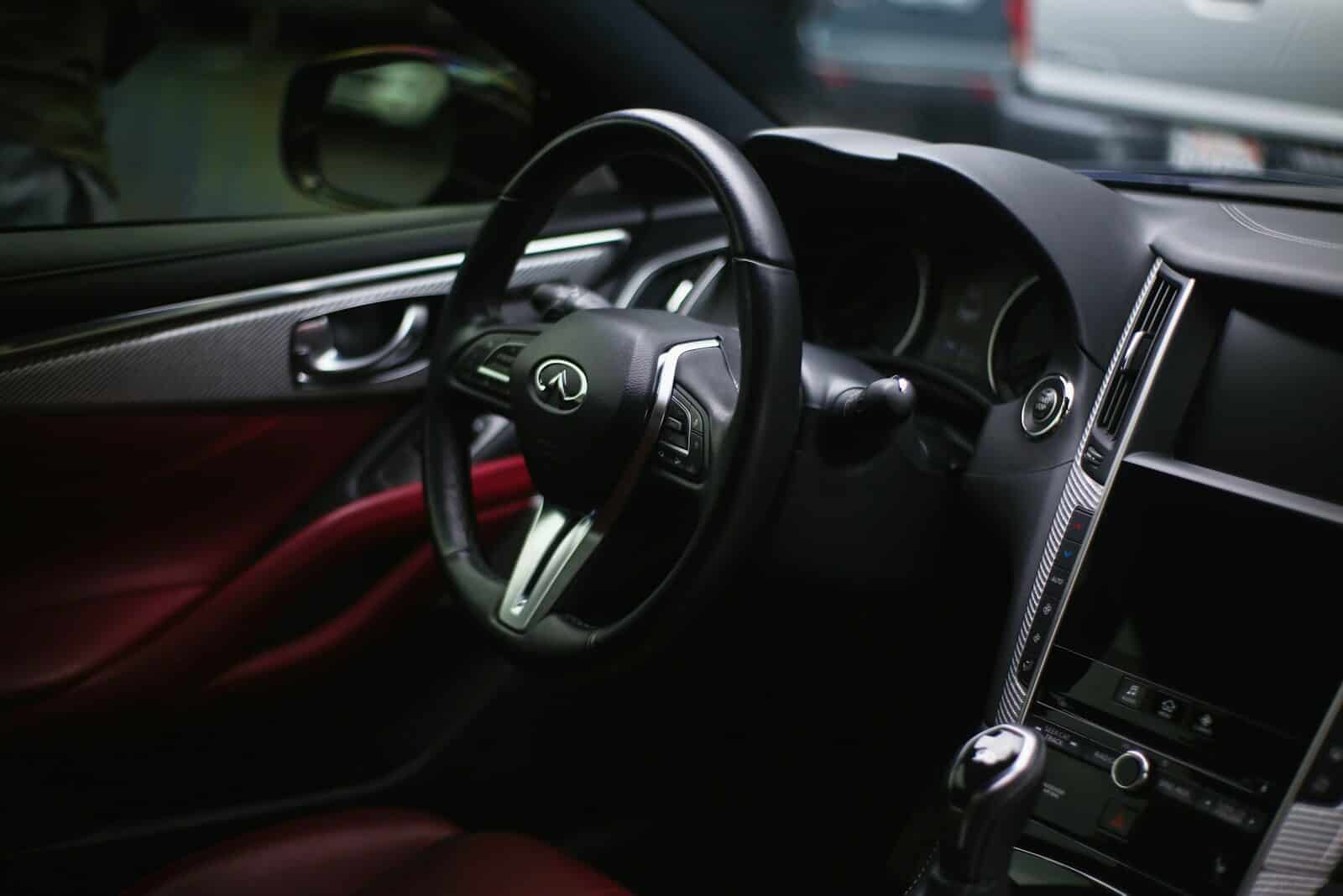 black and silver mercedes benz steering wheel